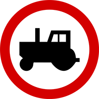 Znak B-6 Zakaz wjazdu ciągników rolniczych oraz pojazdów wolnobieżnych.